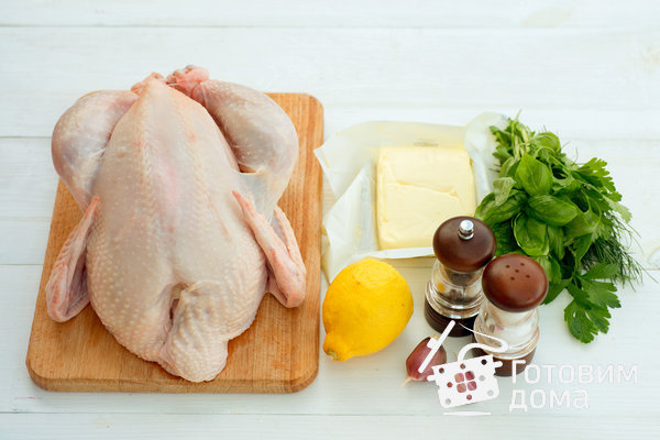 Курица, запеченная с ароматным сливочным маслом и чесноком фото к рецепту 1