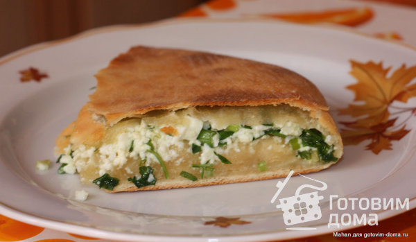 Осетинский  пирог с начинкой из сыра, зелени  и яиц фото к рецепту 1